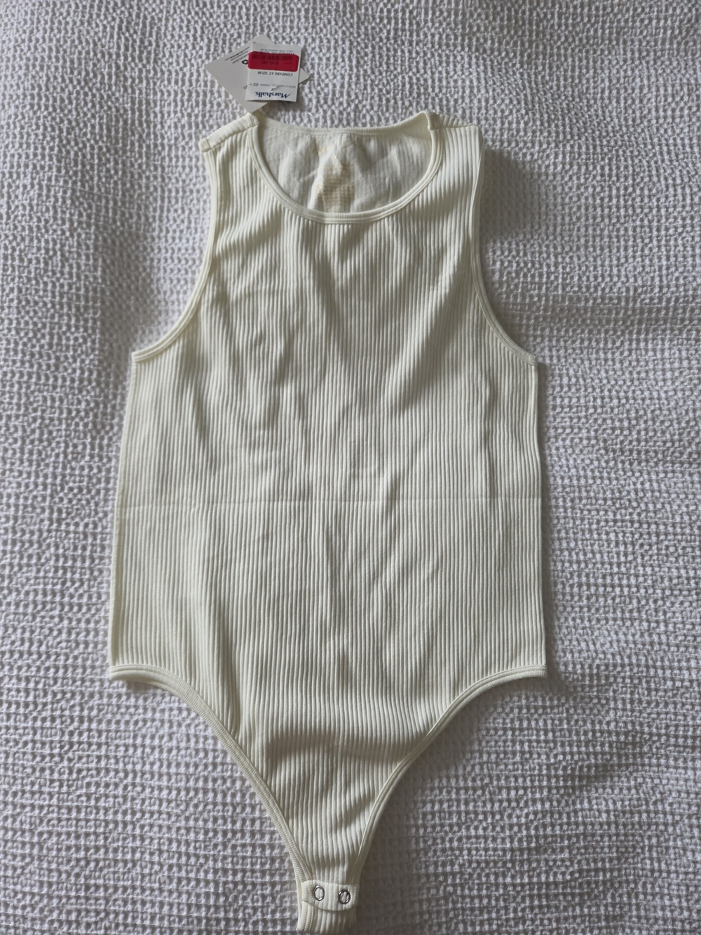 Ribbed Cream One-Piece Bodysuit